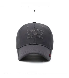 Detailed close-up of dark grey cotton baseball cap with 3D embroidery and air vents