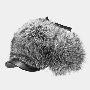 Thick Russian trapper hat with faux fur lining and black leather brim for winter warmth