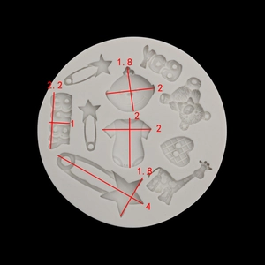 Detailed view of silicone mold dimensions for baby shower themed fondant cake decorations