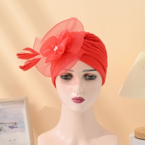 Elegant red mesh turban hat for women featuring large flower, feathers and pearls