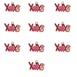 Macro shot of 10 gold-plated XOXO heart pendants with pink glitter inlay for jewelry making