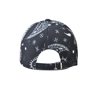 Detail view of cotton baseball cap with artistic print and silver metal adjustment buckle