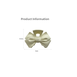 Detailed size view of cream hair claw clip with bow design measuring 9cm by 5.9cm