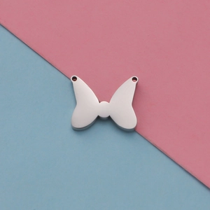 Polished silver stainless steel bow-shaped pet charm with dual holes for DIY jewelry