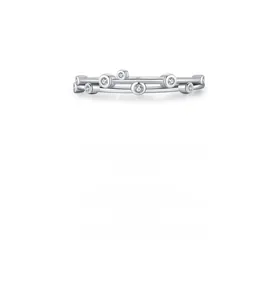 Detail of silver S925 multi-layered thin band ring with zircon insets on white backdrop