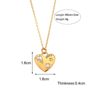 Detail view of heart pendant with stars and crystals including size measurements