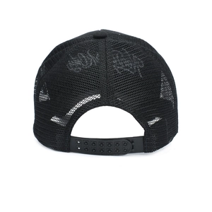 Detail of breathable mesh back and adjustable plastic snap closure on black trucker hat