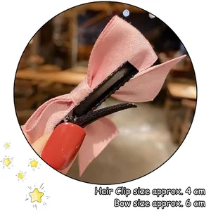Pink silk bow hair clip for girls with a 4cm duckbill clip and 6cm bow dimensions