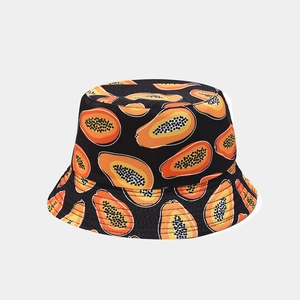Reversible bucket hat featuring tropical orange papaya print on a premium black canvas fabric