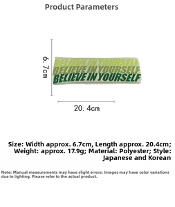 Detail view of light gray sports headband with dimensions 20.4cm by 6.7cm and Believe print