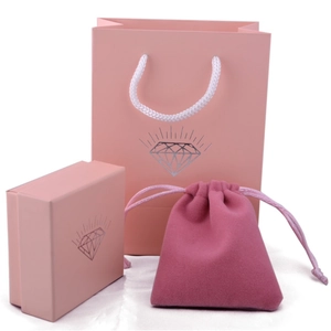 Pink jewelry packaging set including gift box, paper bag, and velvet pouch
