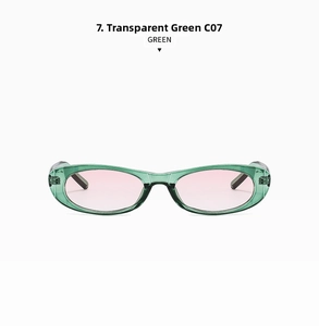 Detail of transparent green narrow cat-eye sunglasses with pink tinted lenses