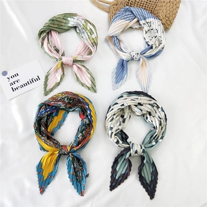 Set of four pleated square scarves with floral and geometric patterns for women