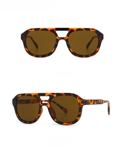 Detail view showing front and 45-degree angles of leopard tan square sunglasses