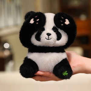 Plush panda doll with heart paw embroidery and soft long fur, held in hands