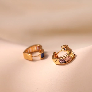 Elegant 18K gold-plated heart hoop earrings with rainbow baguette cubic zirconia stones
