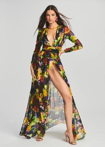Detailed view of deep V-neck and high side slit on the colorful artistic floral maxi dress