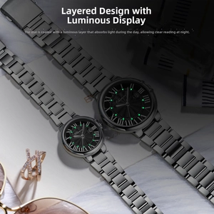 Luminous Roman numeral indices on Chenxi couple watches with polished steel band