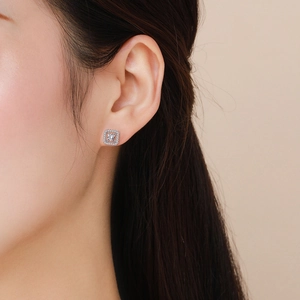 Elegant S925 sterling silver square stud earrings with zircons shown on a model
