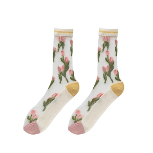 Sheer tulip embroidered socks with pastel pink flowers and yellow trim accents