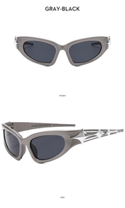 Futuristic cat-eye sunglasses with silver-tone metal accents and gray-black lenses