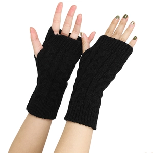 Detail showing black cable-knit fingerless gloves with ribbed cuffs on white background