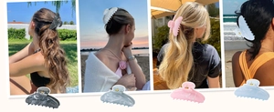 Detail view of marble pattern hair claw clips in grey blue pink and white colors