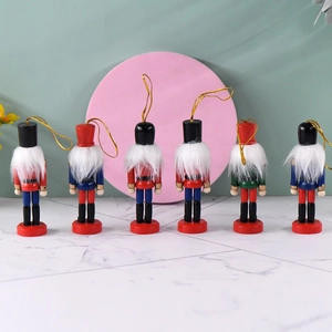 Set of six 10cm wooden nutcracker ornaments with festive uniforms for Christmas tree decor