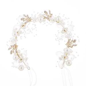 Elegant bridal floral headband with pearls, rhinestones, and delicate ribbons on white background