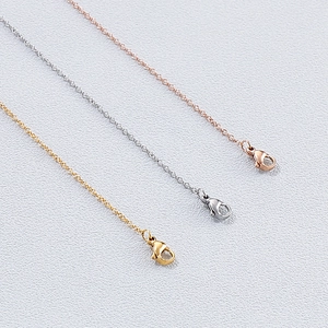 Three-color minimalist O-chain necklace links in gold, silver, and rose gold finishes