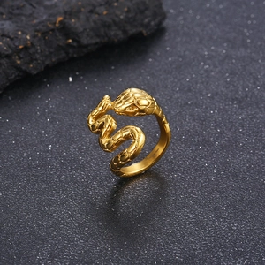 Macro detail of snake ring showing realistic golden scales and intricate serpent head design