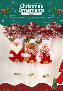 Detailed view of plush Santa, Reindeer, and Snowman ornaments with small golden bells
