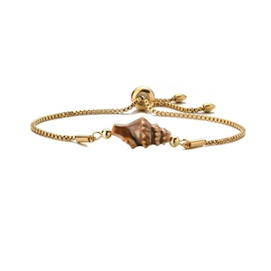 Bohemian gold chain bracelet featuring a brown conch shell charm and adjustable slider