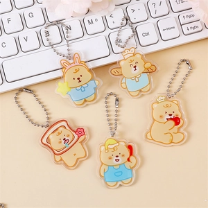 Cute cartoon yellow bear acrylic keychain set with metal bead chains for bags