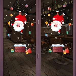 Stickers de Noël pour vitrine avec Père Noël dans la cheminée et cadeaux colorés