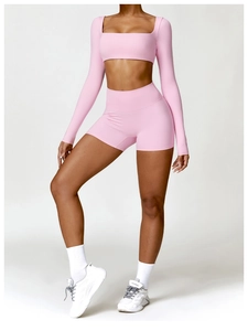 Pink two-piece yoga set featuring a square neck long sleeve top and high waist shorts