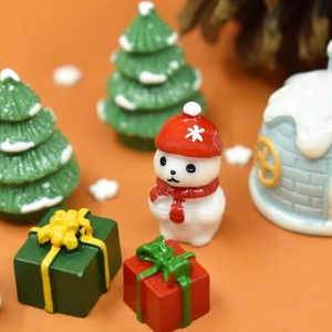 Miniature Christmas resin set featuring snowman, snowy trees, and gift boxes decor