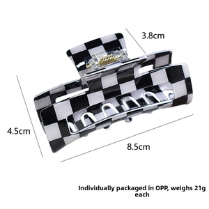 Detailed size specifications of the black and white checkerboard hair claw clip