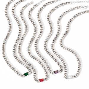 Polished stainless steel necklace set with emerald, red, purple and white cubic zirconia