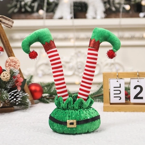 Christmas elf legs tabletop decoration with red white stripes and glitter green boots