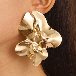 Irregular wrinkled gold flower earrings with a high-shine metallic mirror finish
