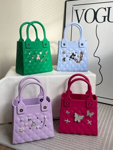 Detail showing waterproof EVA candy colored bags with DIY charms and lattice pattern
