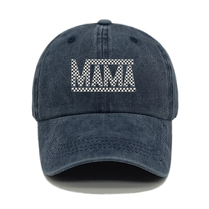Detailed texture of navy washed denim baseball cap with checkered MAMA letter embroidery