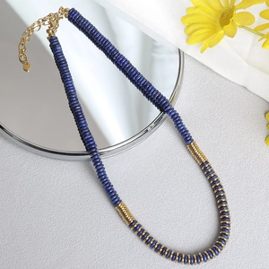 Lapis lazuli beaded necklace with gold metal spacers and adjustable lobster clasp