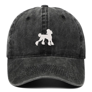 Detail of white embroidered poodle on distressed dark grey washed cotton baseball cap