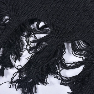 Detail of black knit tank top featuring distressed frayed edges and fringe hem textures