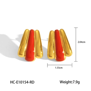 Detailed view of red enamel shell earrings with 18k gold plating showing size and weight