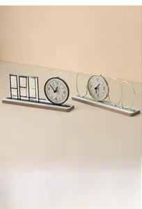 Detailed close-up of iron clock ornaments with wood dials on modern metal frames
