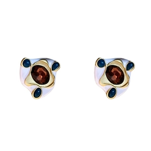 Vintage oval enamel earrings with gold plating and blue stones in a retro palace style