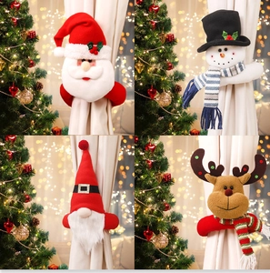 Detail view of cartoon Santa, Snowman, and Gnome plush Christmas curtain tiebacks set